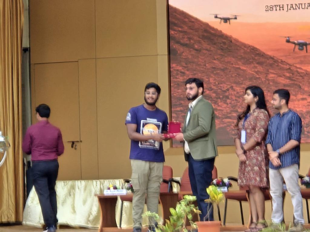 Team Vicharaka receiving recognition on stage